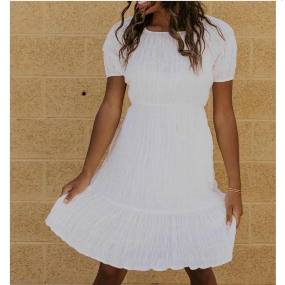 14. Roolee The Dynamos white dress